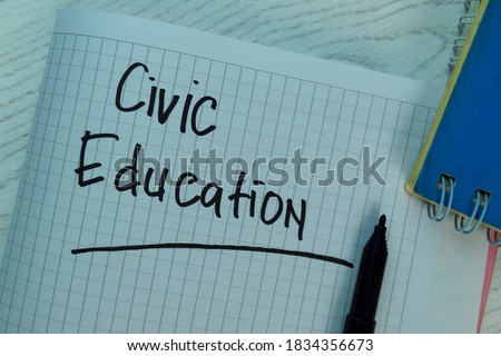 Civic Education write on a book isolated on office desk. Selective focus on Civil Education