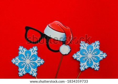 christmas background space for text, holiday decor for photo shoot, paper glasses and snowflakes, new year children's accessories