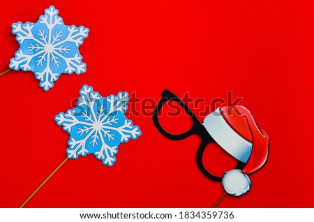 christmas background space for text, holiday decor for photo shoot, paper glasses and snowflakes, new year children's accessories