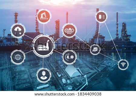 Industry 4.0 technology concept - Smart factory for fourth industrial revolution with icon graphic showing automation system by using robots and automated machinery controlled via internet network .