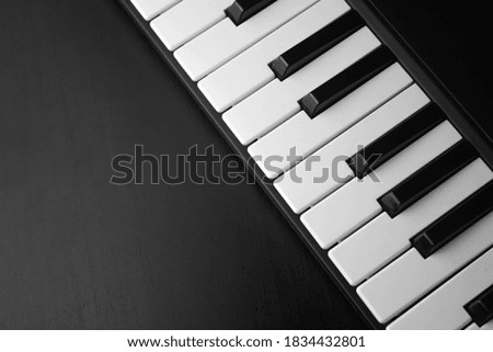 Background, piano keyboard dark light