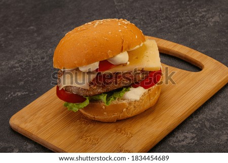Delicous burger with tuna fish and cheese