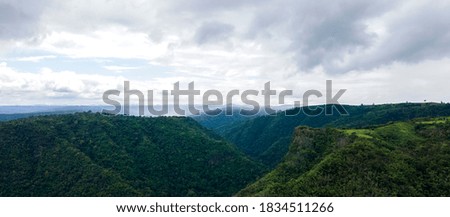 Panorama view landscape mountain White clouds sky on background.