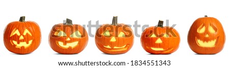Set of carved Halloween pumpkins on white background. Banner design Royalty-Free Stock Photo #1834551343