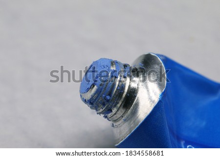 close-up blue paint tube detail