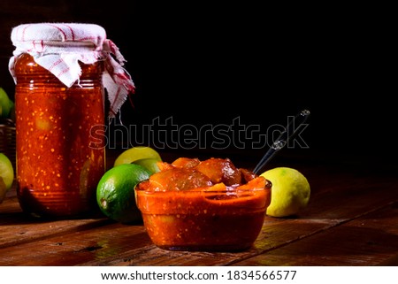 South Indian home made spicy lemon pickle on a rustic kitchen background Royalty-Free Stock Photo #1834566577