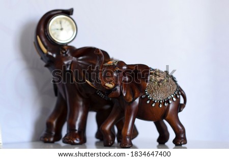 decorative elephants, clocks and elephant