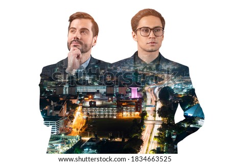 Double exposure of two young, successful, business people, man, standing in front of Asian city Kuala Lumpur background. Concept of teamwork. Night time.