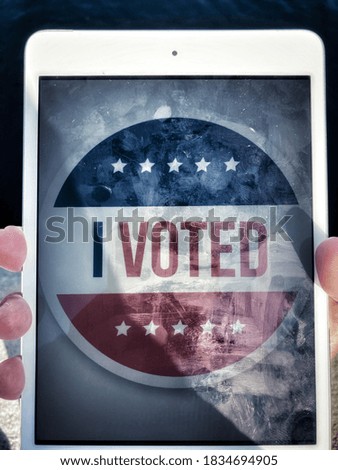 İllustrated photo of i voted today picture , man holding digital tablet
