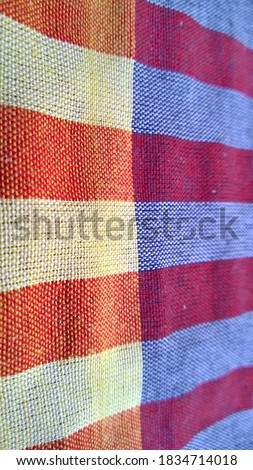 Orange and Purple loincloth texture with orange and purple gingham seamless pattern, abstract plaid, Texture background for Loincloth or Thai bathing cloth.