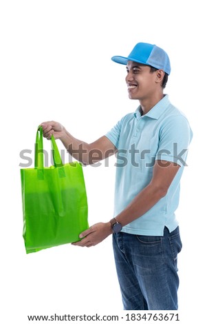 online grocery store. online driver courier carrying groceries. delivery service isolated over white background