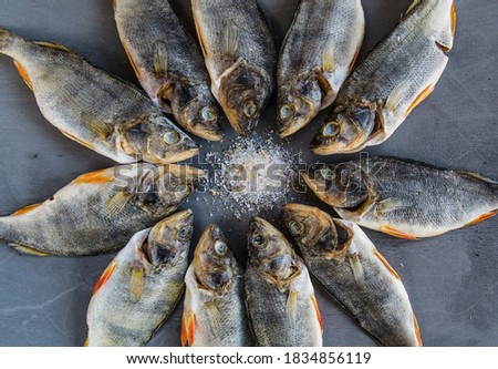 Dried salted fish in the circle -  stock fish
