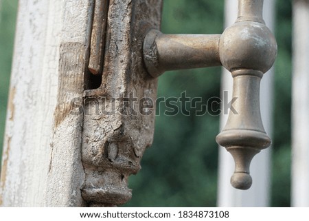 Old rustic wooden window in the country house. Selective focus. Abstract background.
