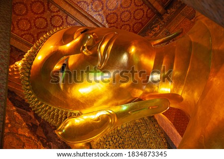 Famous "Reclining Buddha" statue in the Wat Pho, Bangkok, Thailand