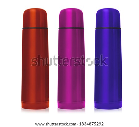 Set of modern thermoses in different colors on white background 