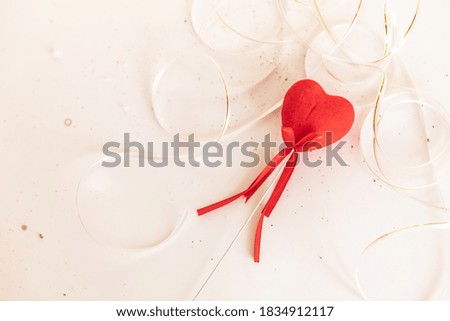 lovers' day. Valentine's Day. a single red heart on a white isolated background. Copy space