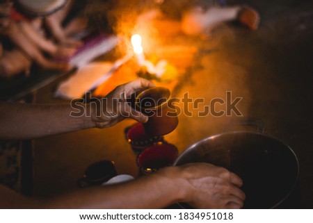 cacao ceremony with fire and smoke Royalty-Free Stock Photo #1834951018