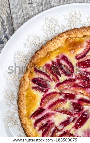 Plum cake on white plate From series Summer desserts