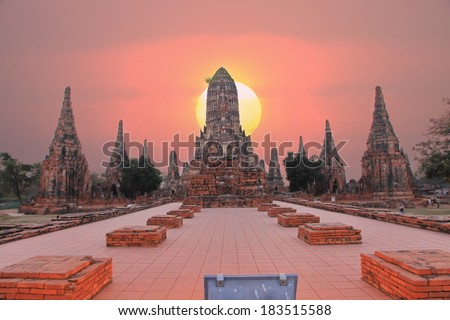 Wat Chai Watthnaram the historic temple in Ayutthaya, Thailand sunset sky background. 