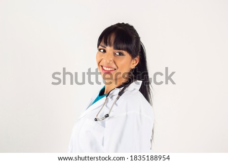 Latina female doctor on white background