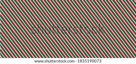 Red panorama vector Christmas wrapping paper background with green and white stripes for holiday themes.