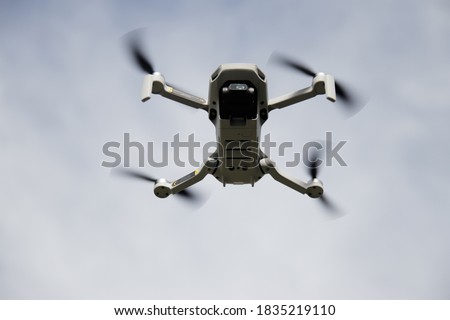 Drone in action outside with blue sky in the background