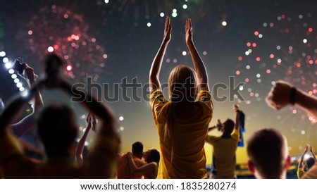 Fans celebrate in Stadium Arena night fireworks High quality photo