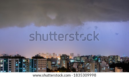 Images of the arrival of a strong summer storm with lightning and rain. Event in the city in the late afternoon, early evening in Niterói, Rio de Janeiro, Brazil