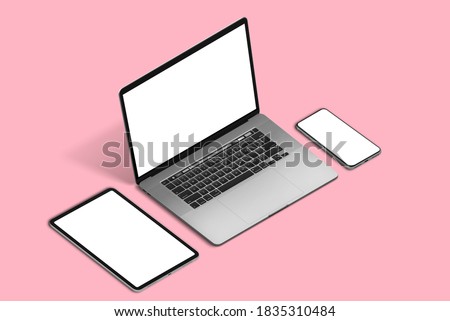 Responsive devices mockup on pink pastel desk. Isometric position. Laptop, tablet and smart phone Royalty-Free Stock Photo #1835310484