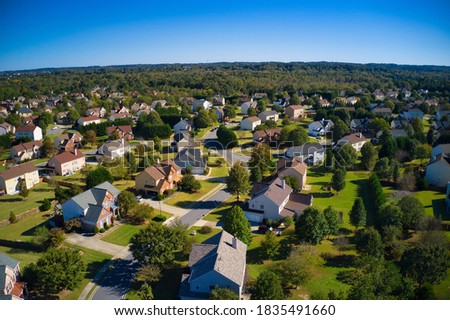 Aerial panoramic view of house cluster in a sub division in Suburbs   in metro Atlanta in Georgia ,USA shot by drone shot during golden hour