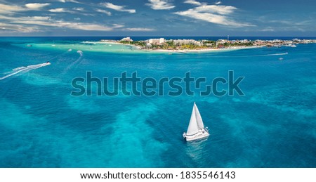isla mujeres island near Cancun Mexico with sail boat Royalty-Free Stock Photo #1835546143