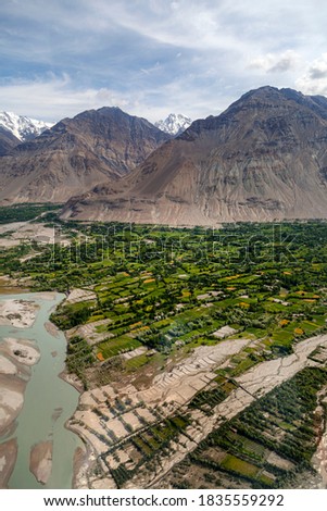 aerial landscape photography of mountains and green valleys of Karakorum range in gilgit Baltistan 