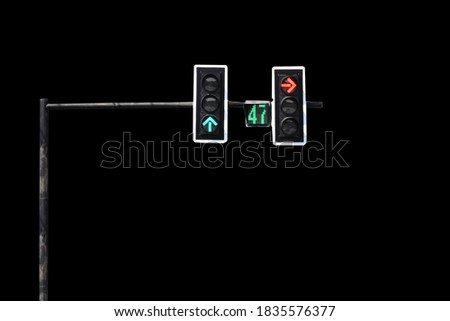 Isolated pole of traffic light with clipping paths on black background.