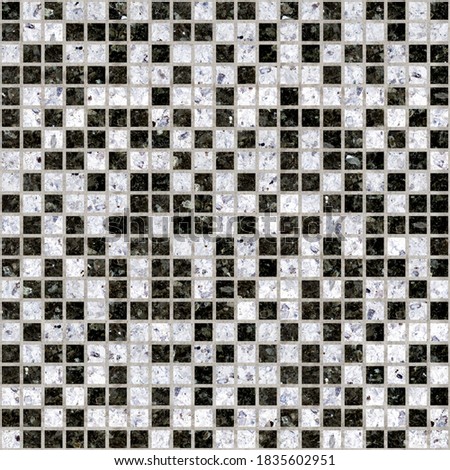 Mosaic in white and black marble. Element for interior design. Ceramic tile