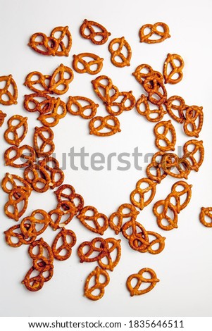 Pretzels in a heart shape on a white background