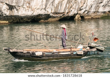 Fishing boats in Ha Long Bay, Cat Ba Island, Vietnam, descending dragon bay Asia 