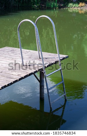 A stairway that leads to water