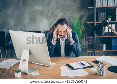 Portrait of his he nice handsome frustrated tired exhausted man executive, expert specialist agent broker feeling dizzy bad syndrome at modern industrial concrete wall work place station