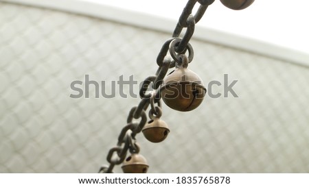 The ring bells were chained in a row