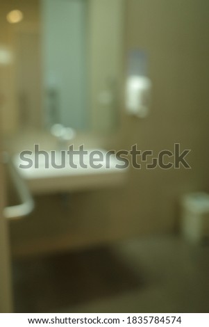Blur focus of Inside disable toilet , black and white background. disable concept.