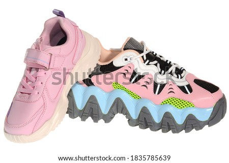 women's and children's sneakers in pink