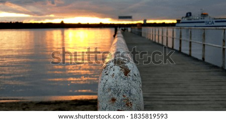 rusty bridge in the sunset
