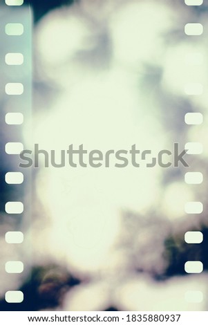 Film Strip Texture with Scratch and Grain Background with Light Leak in Vertical Format, Suitable for Product Presentation, Mockup and Background on Mobile Phone.