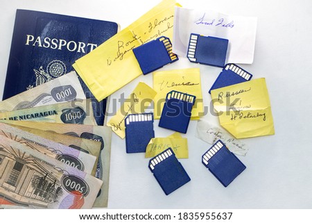 Photographs on Memory Cards Marked With Various Travel Destinations