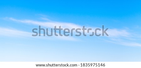 Blue sky with white clouds at daytime, natural panoramic background photo