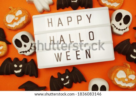 Top view Happy Halloween word in Light box flat lay