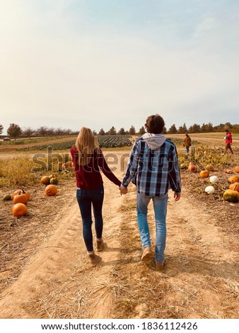 Pumpkin patch couples pictures in fall