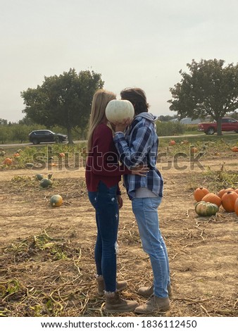 Pumpkin patch couples pictures in fall