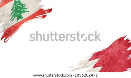 Flags of Lebanon and Welsh on white background
