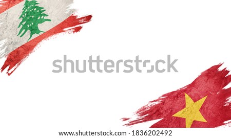 Flags of Lebanon and Vietnam on white background
